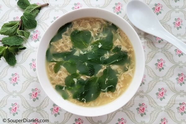 Simple egg drop soup with mint leaves