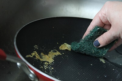 Scrubbing non stick pan