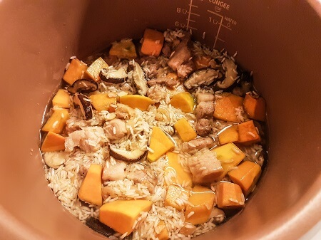 Cooking pumpkin rice in a rice cooker