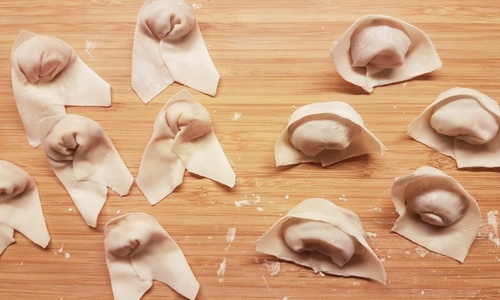 Wrapping wontons in different shapes
