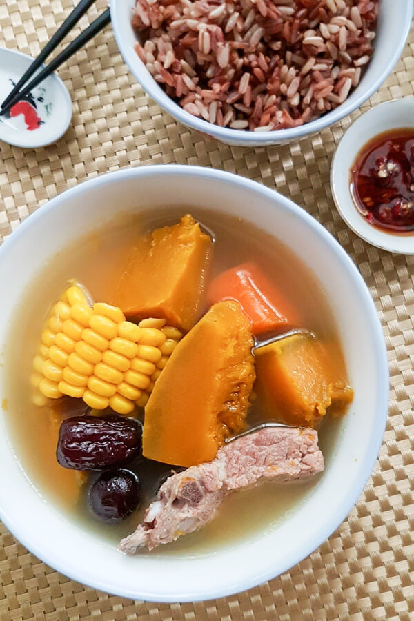 Chinese style pumpkin soup with pork ribs and corn.